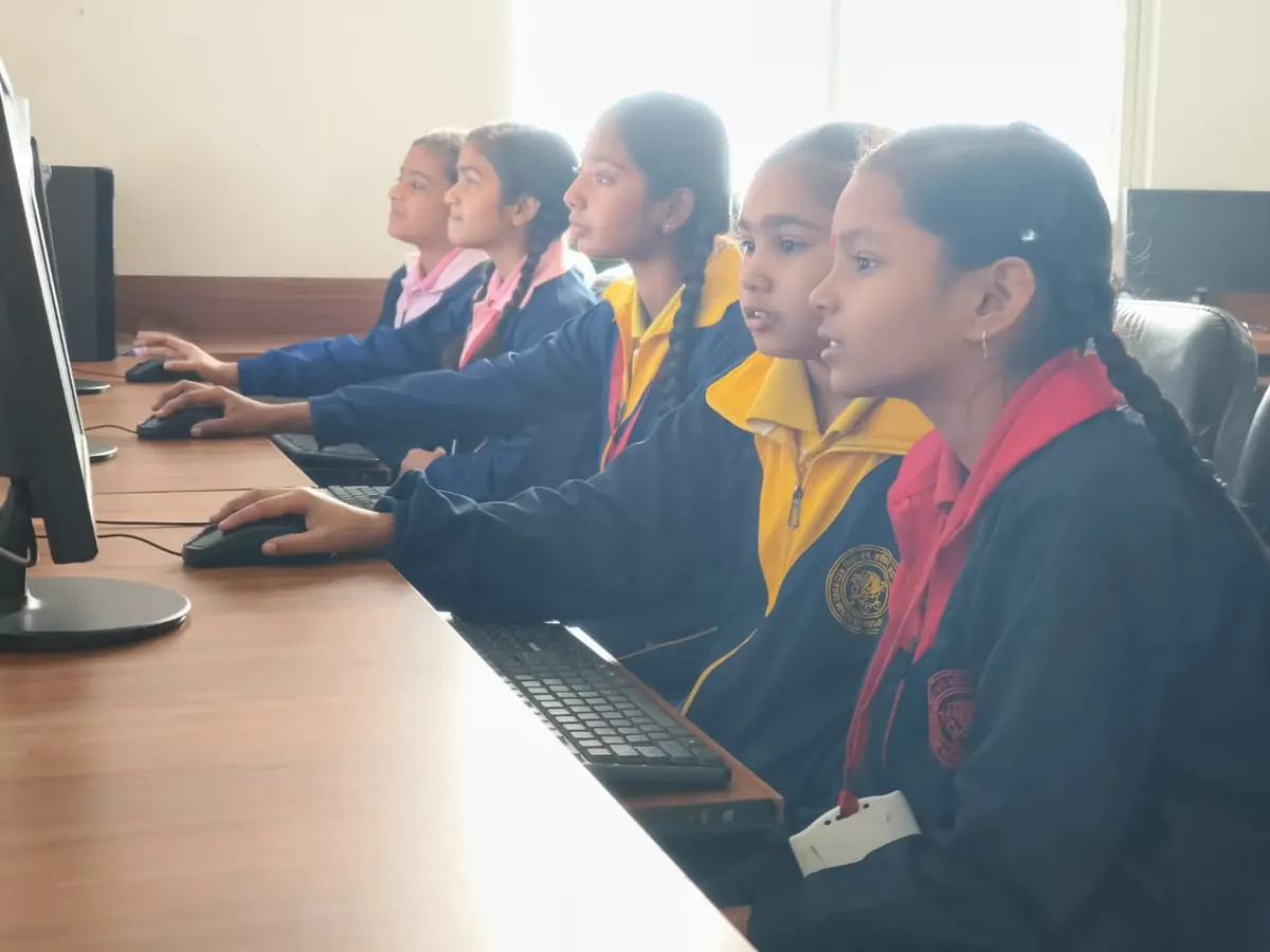 Students doing practical work on computers