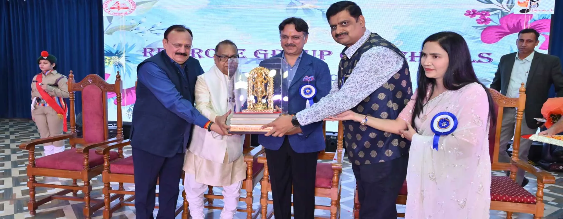 Students being felicitated at a school award ceremony